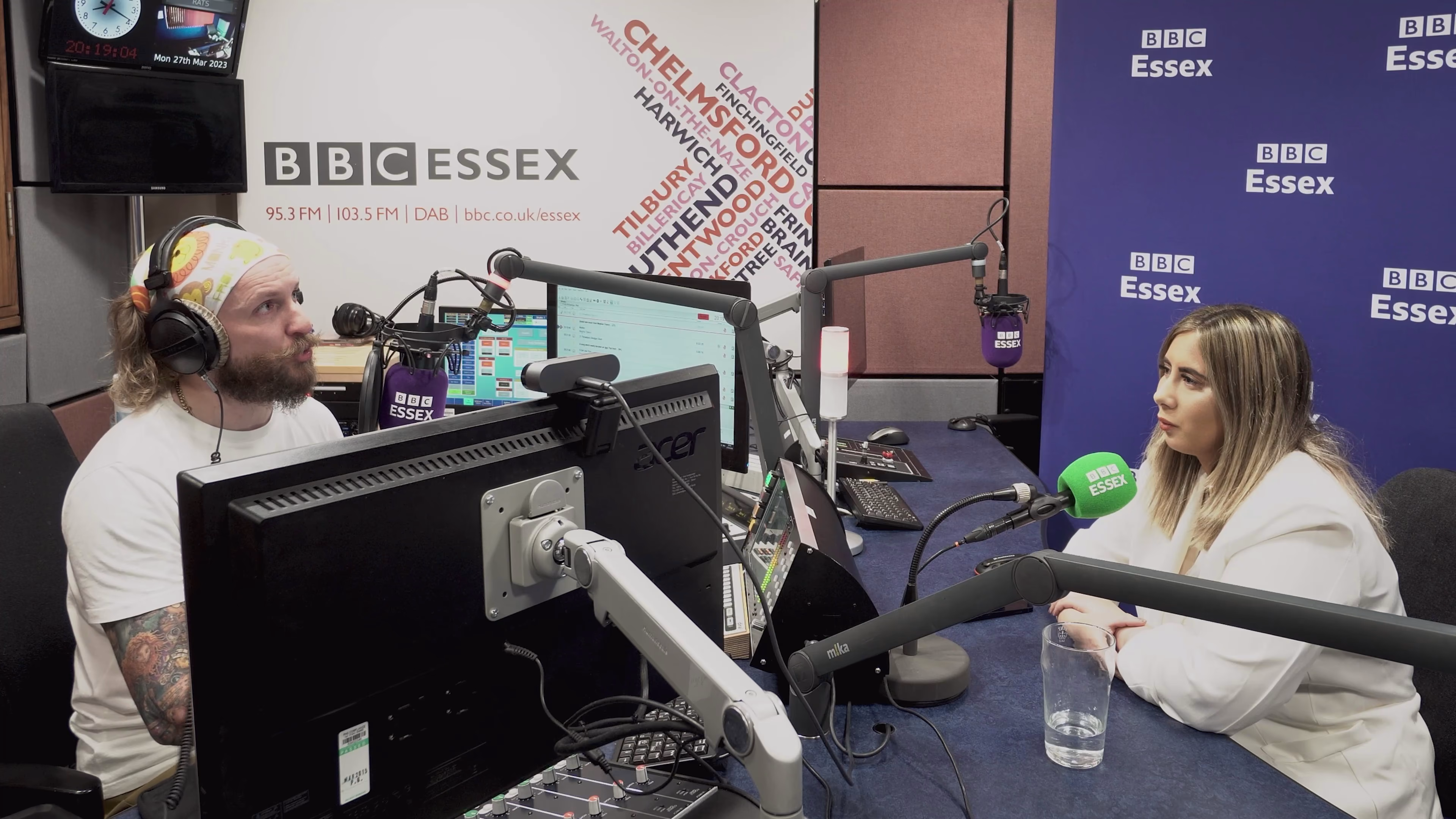 Sophie Taylor speaking into a microphone during her radio interview